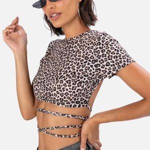 Cheetah print tie long strap crop top w open back. Many ways you can tie the top